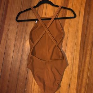 Burnt orange body suit - never worn